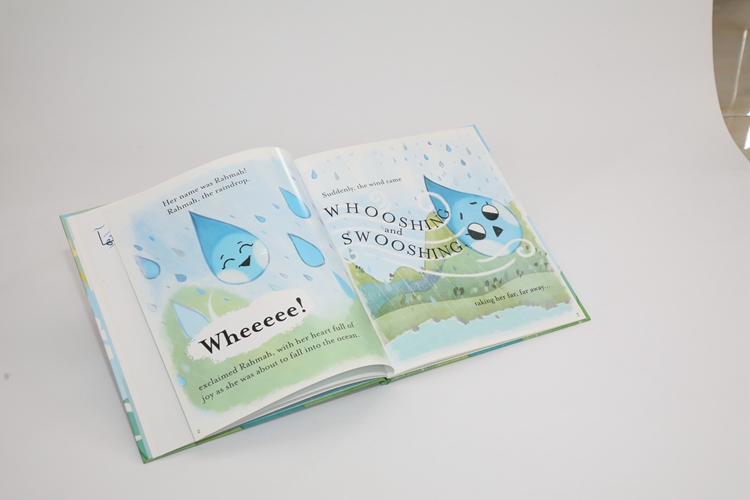 hardcover book with glitter text pages